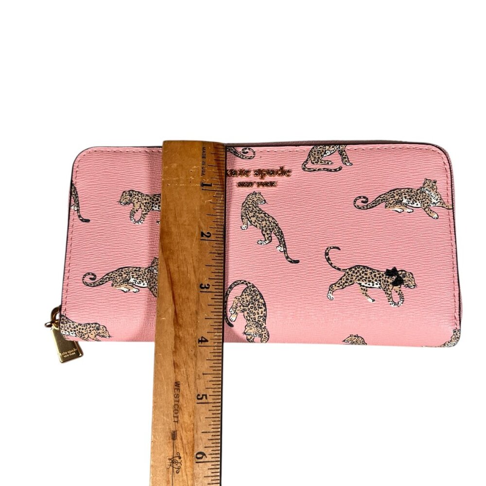 Share Similar items Sponsored See all  Kate Spade Sylvia Continental Zip Around - Picture 12 of 13